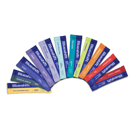 Collection of Blueshift skin defense plus products in various colors on a white background