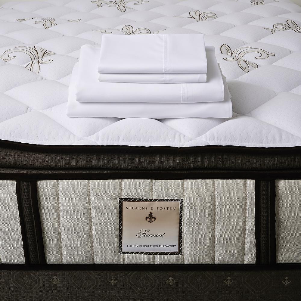 The Fairmont Signature Bed - Sealy Sterns & Foster mattress and folded bed sheets